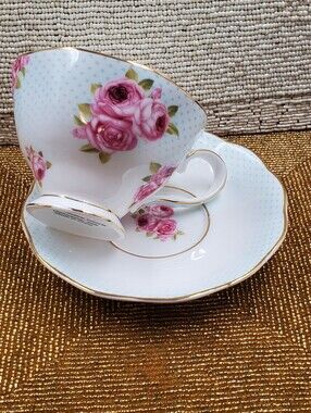 Beautiful bone china pink rose and polka dot teacup and saucer set by Coastline